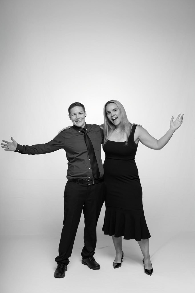 Wedding guest portrait on a white seamless backdrop at Andrea and Hugh's wedding (black and white)
