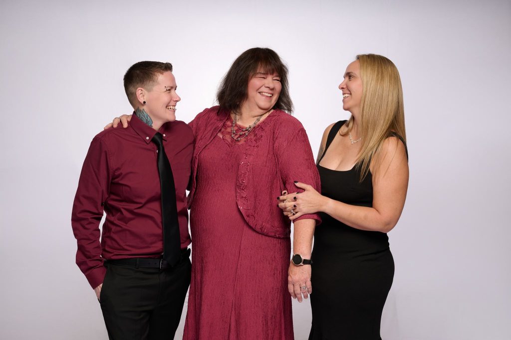 Wedding guest portrait on a white seamless backdrop at Andrea and Hugh's wedding