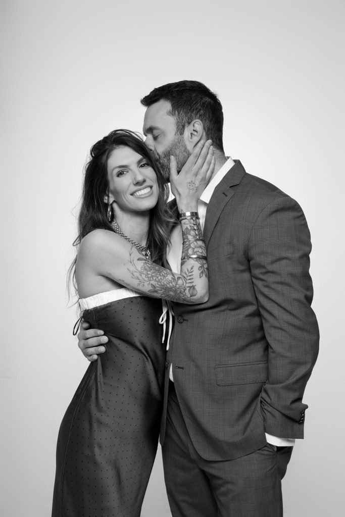 Wedding guest portrait on a white seamless backdrop at Andrea and Hugh's wedding (black and white)