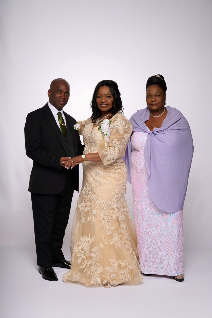 Wedding guest portrait on a white seamless backdrop at Andrea and Hugh's wedding