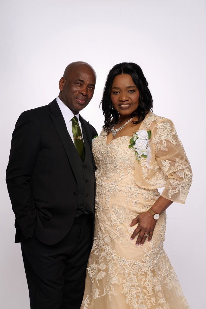Wedding guest portrait on a white seamless backdrop at Andrea and Hugh's wedding