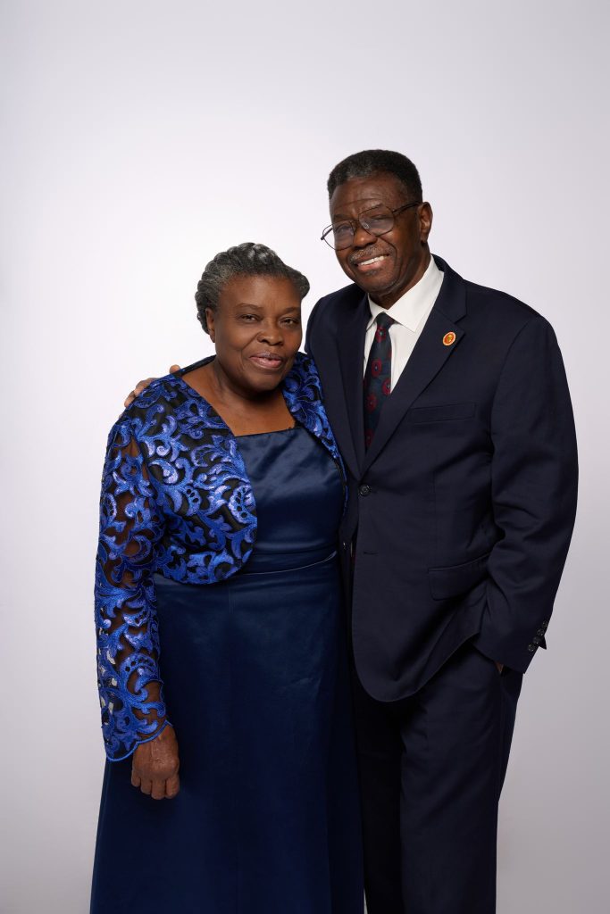 Wedding guest portrait on a white seamless backdrop at Andrea and Hugh's wedding
