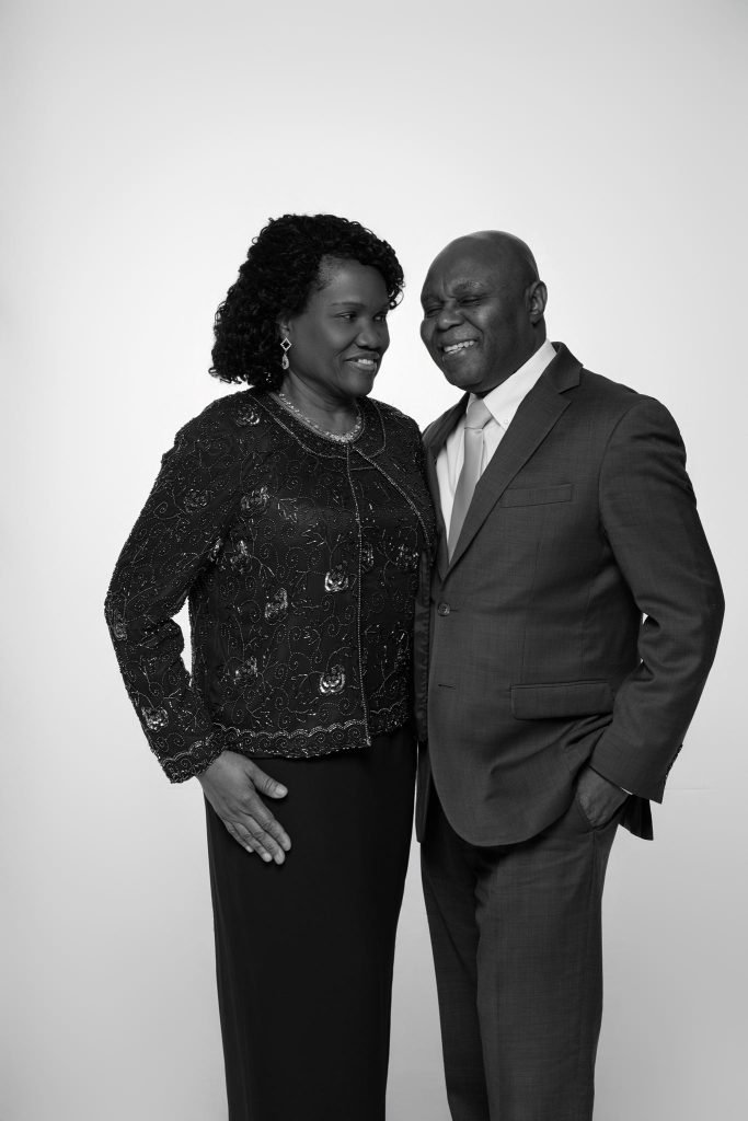 Wedding guest portrait on a white seamless backdrop at Andrea and Hugh's wedding (black and white)