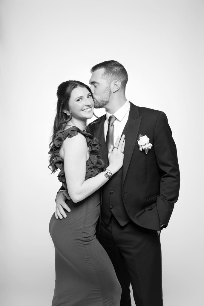 Wedding guest portrait on a white seamless backdrop at Andrea and Hugh's wedding (black and white)