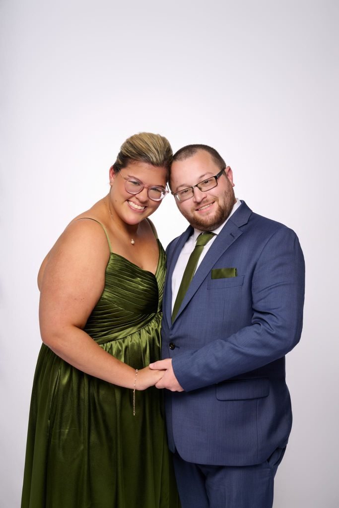 Wedding guest portrait on a white seamless backdrop at Andrea and Hugh's wedding