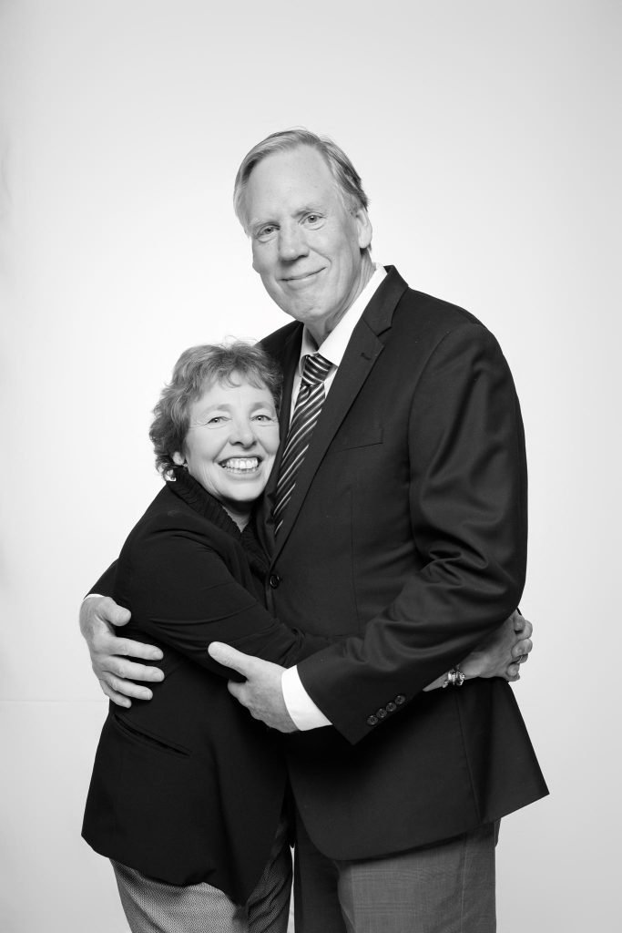 Wedding guest portrait on a white seamless backdrop at Andrea and Hugh's wedding (black and white)