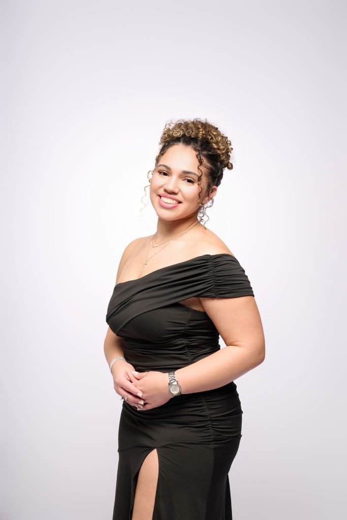 Wedding guest portrait on a white seamless backdrop at Andrea and Hugh's wedding