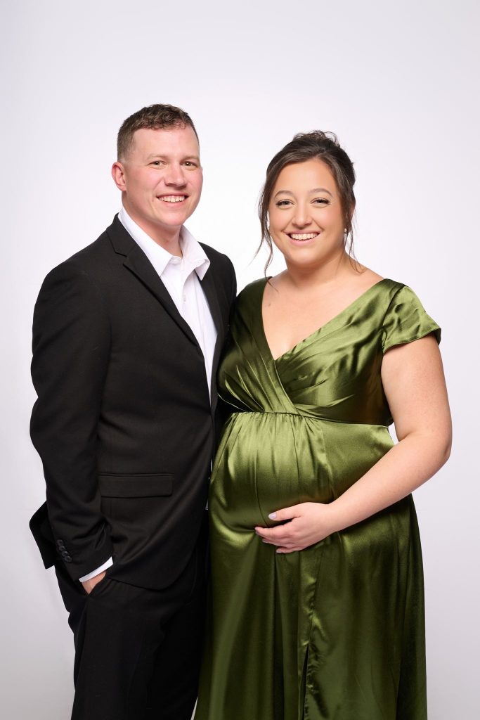 Wedding guest portrait on a white seamless backdrop at Andrea and Hugh's wedding
