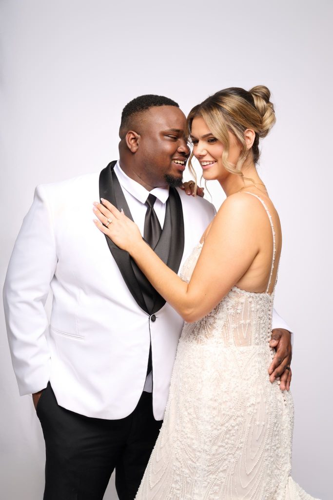 Wedding guest portrait on a white seamless backdrop at Andrea and Hugh's wedding