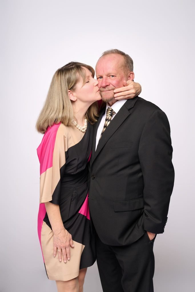 Wedding guest portrait on a white seamless backdrop at Andrea and Hugh's wedding
