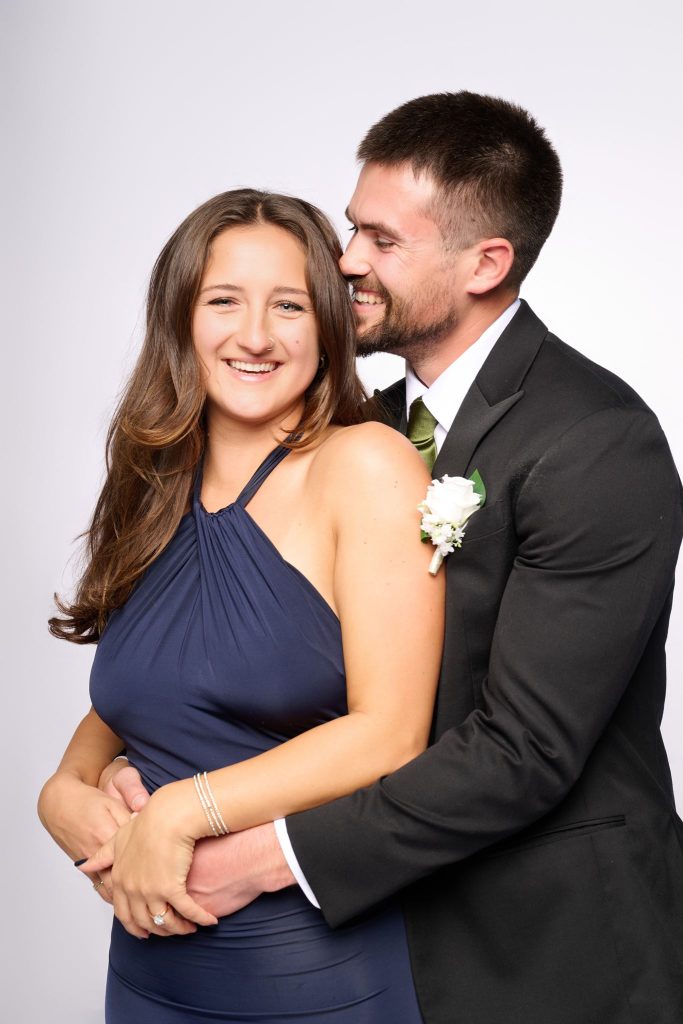 Wedding guest portrait on a white seamless backdrop at Andrea and Hugh's wedding