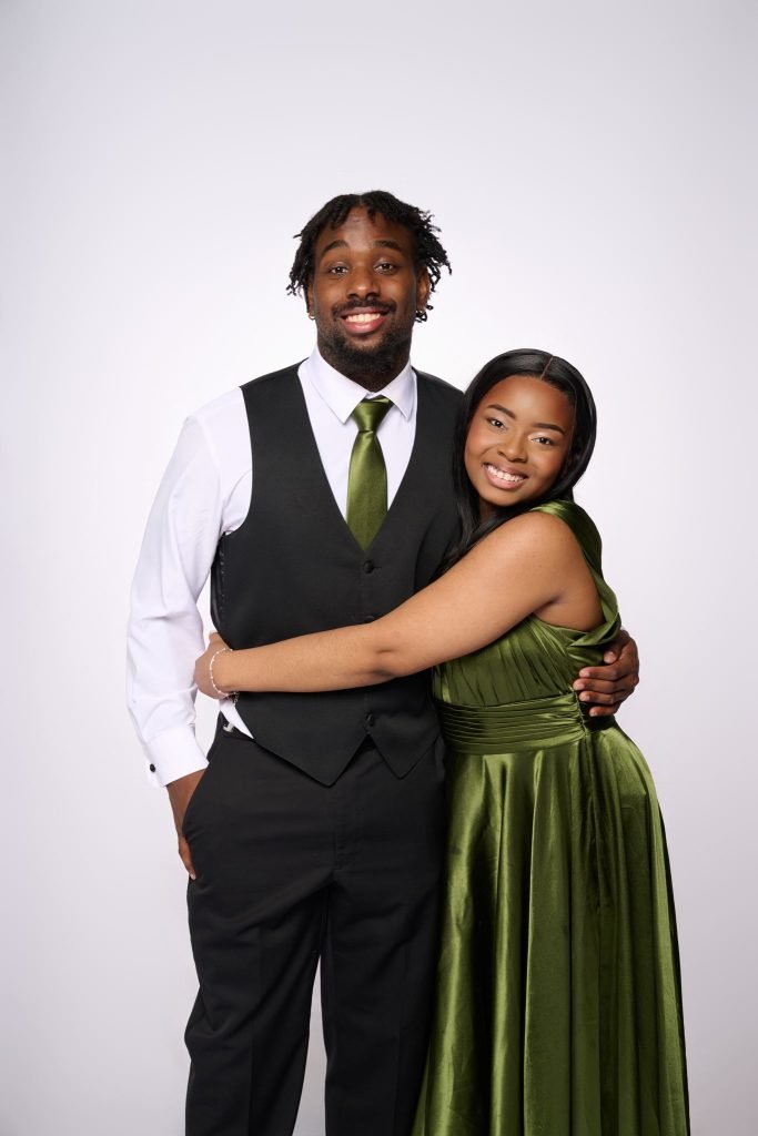 Wedding guest portrait on a white seamless backdrop at Andrea and Hugh's wedding
