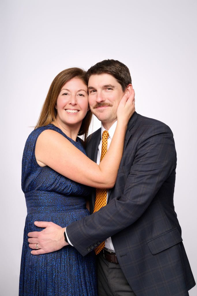 Wedding guest portrait on a white seamless backdrop at Andrea and Hugh's wedding