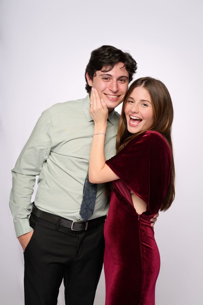 Wedding guest portrait on a white seamless backdrop at Andrea and Hugh's wedding