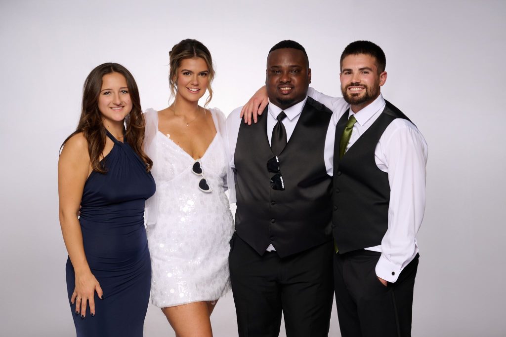 Wedding guest portrait on a white seamless backdrop at Andrea and Hugh's wedding
