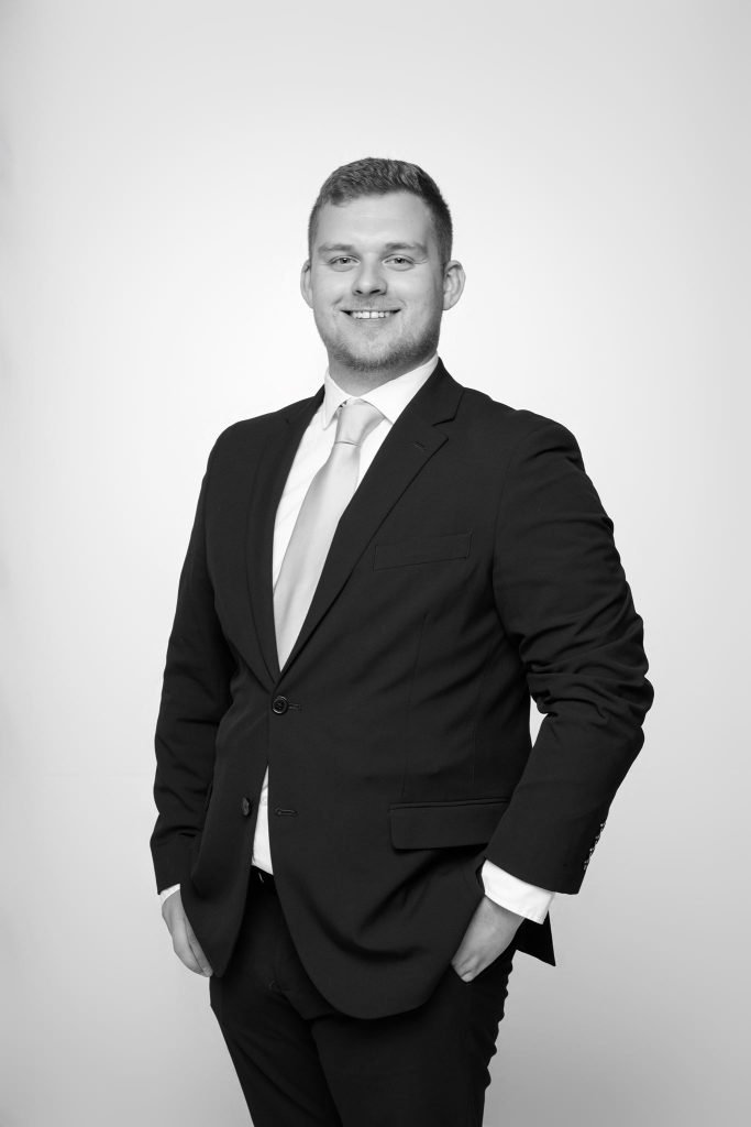Wedding guest portrait on a white seamless backdrop at Andrea and Hugh's wedding (black and white)