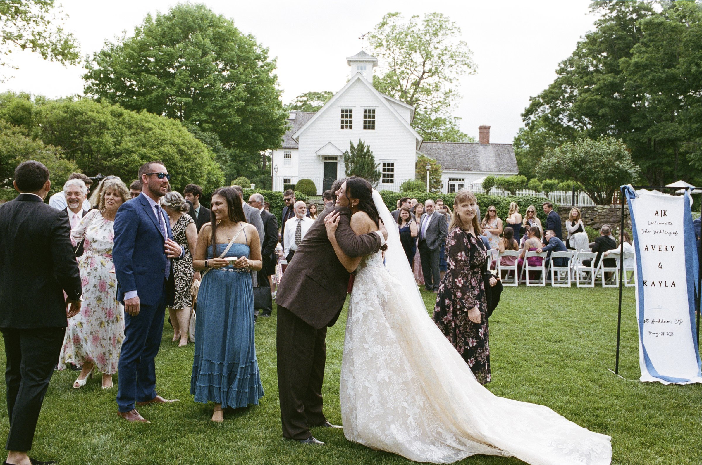 Guests greeting Kayla and Avery after the ceremony