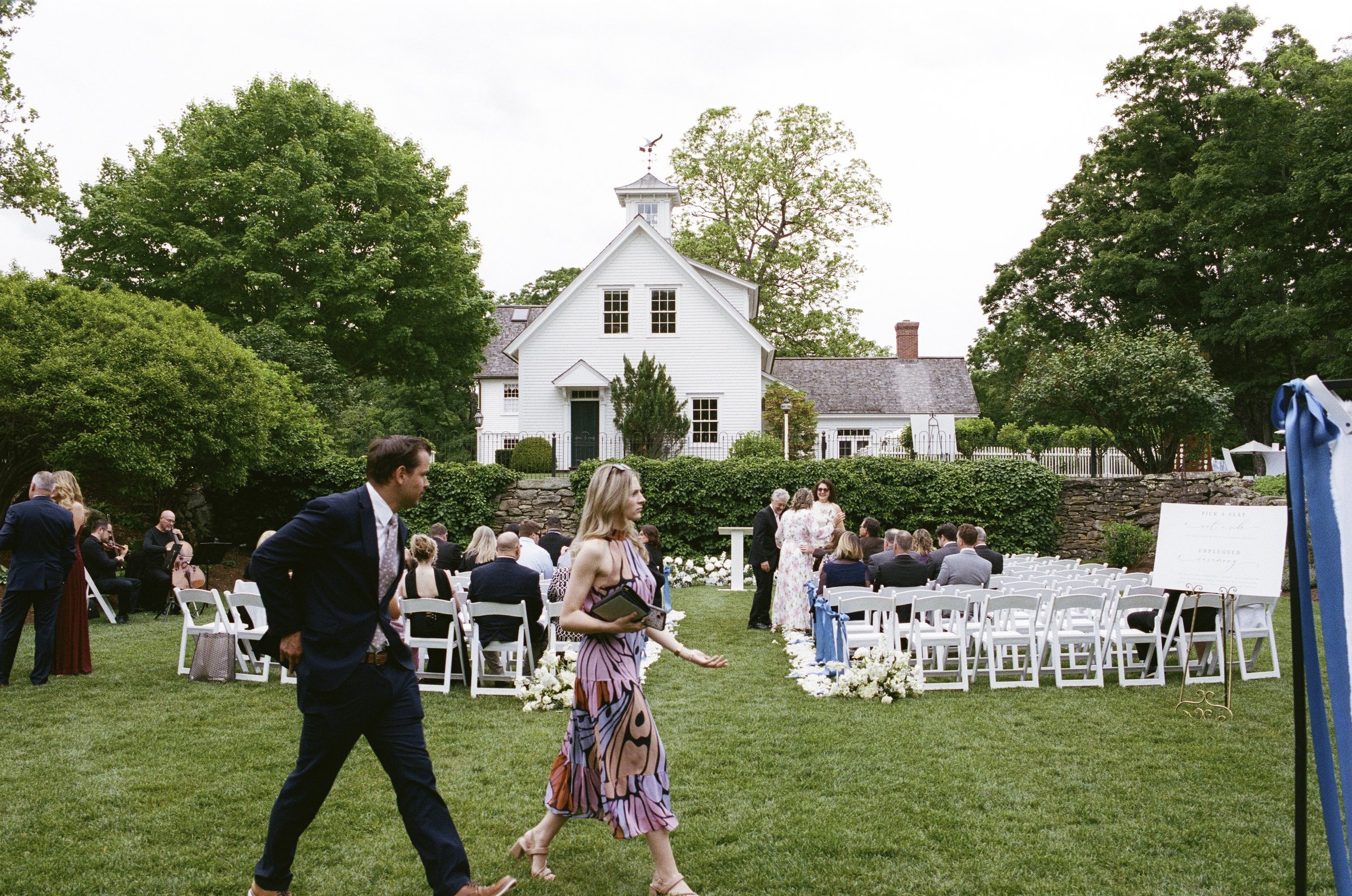 Guests walking from the ceremony to the tent