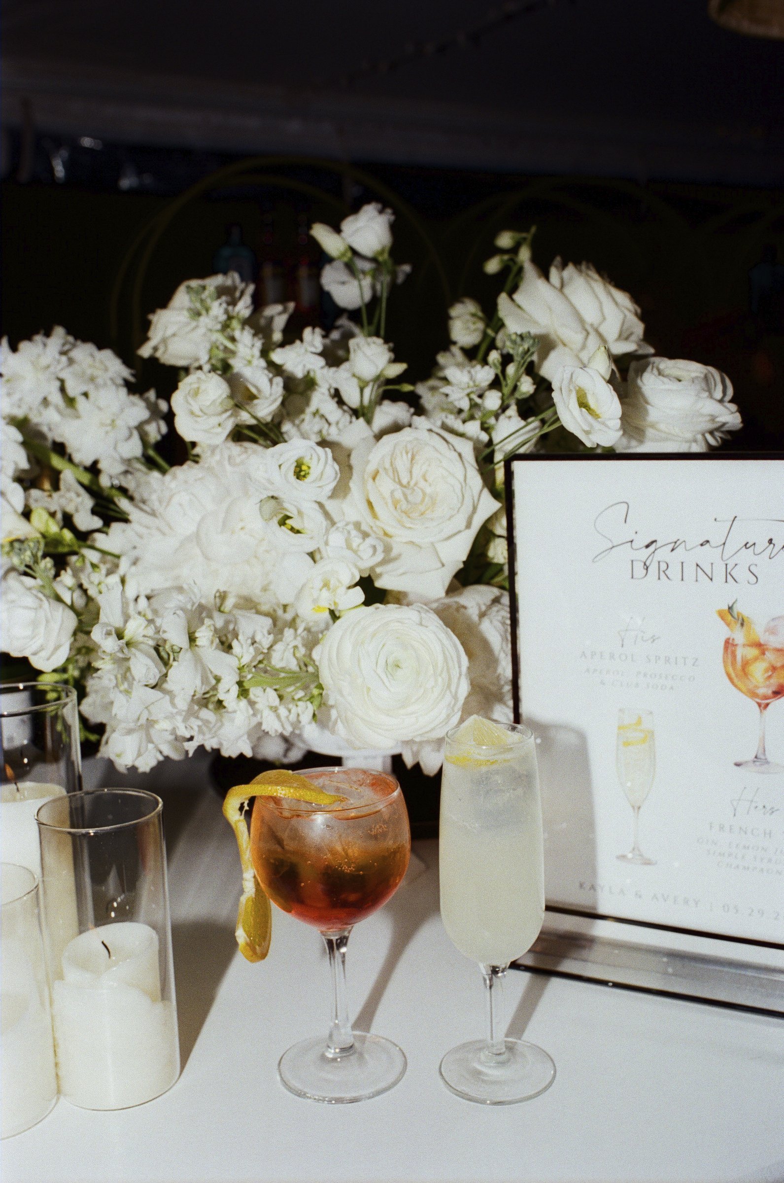 White flowers and drinks at the bar