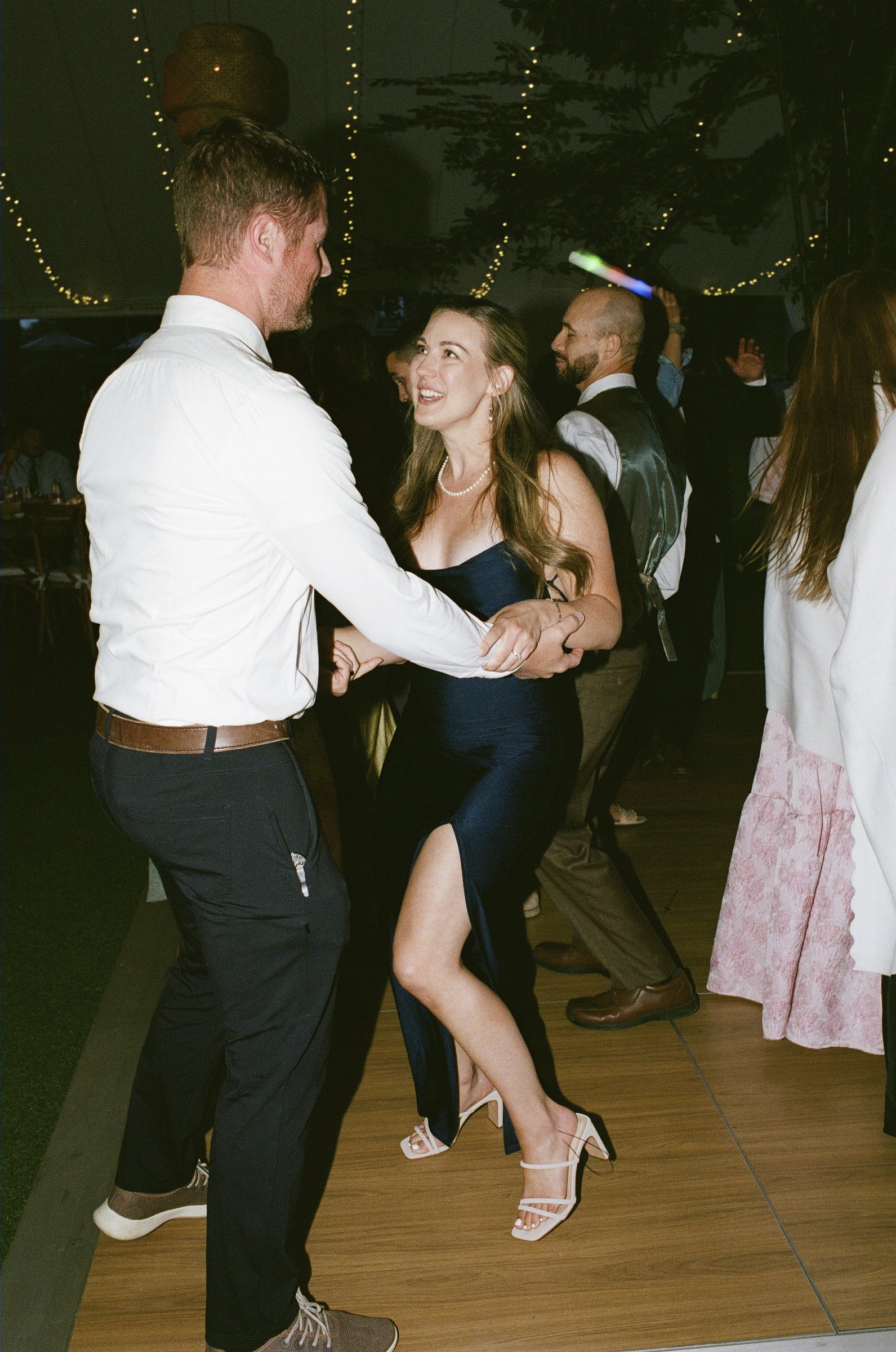Guests dancing at the reception