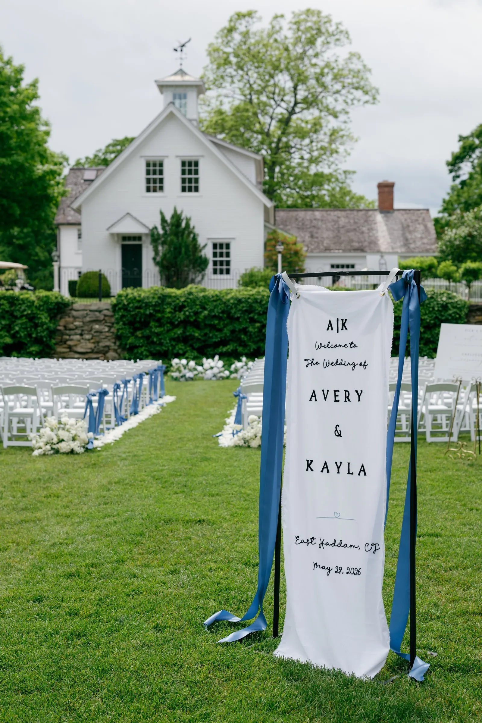 The welcome banner for Avery and Kayla on the ceremony lawn