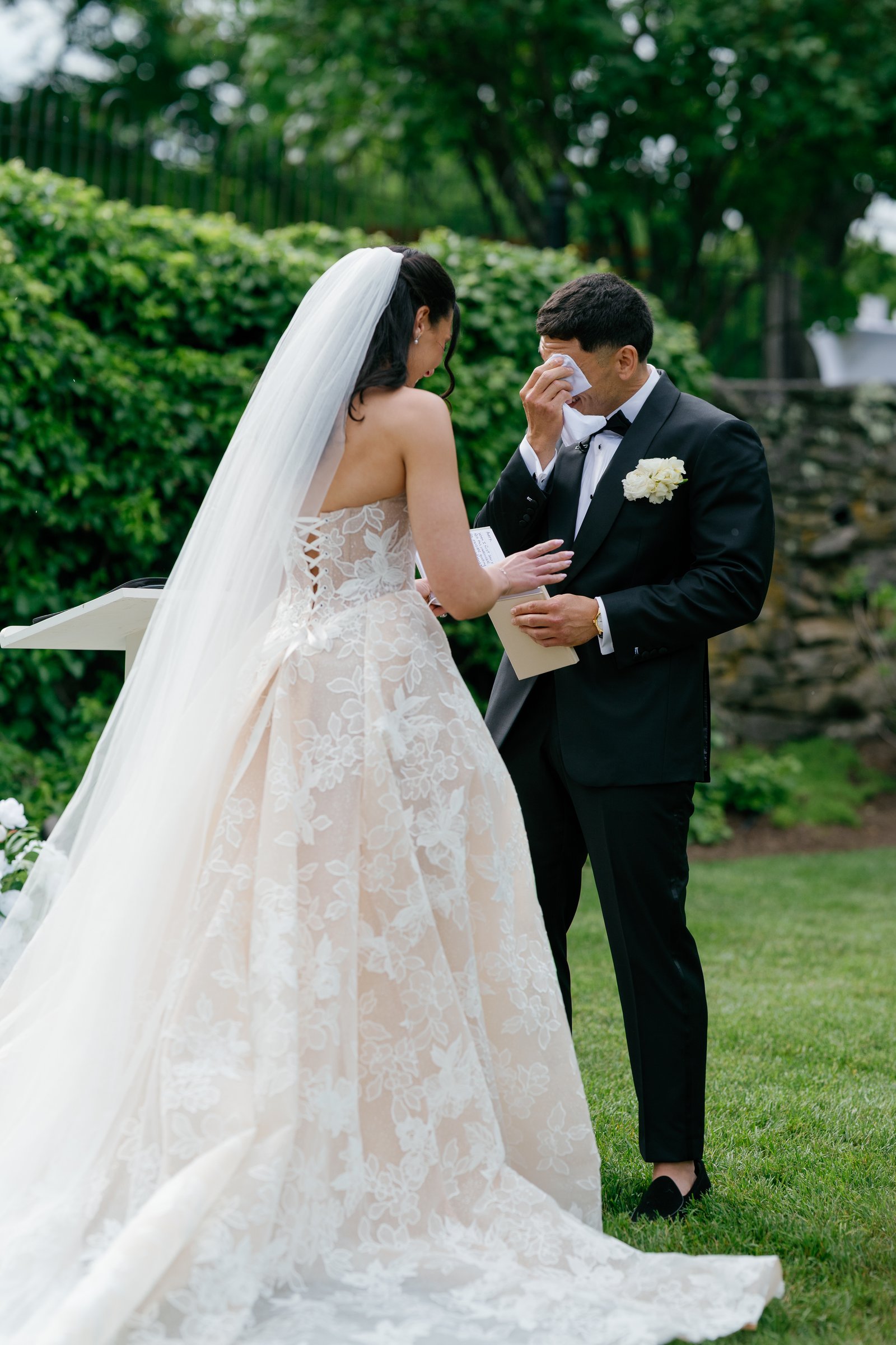 Avery wiping away tears during the vows
