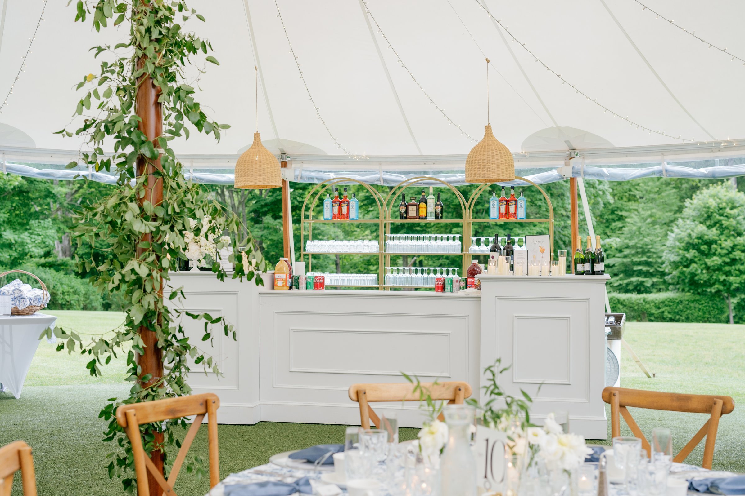 The bar under the tent, wrapped in greenery
