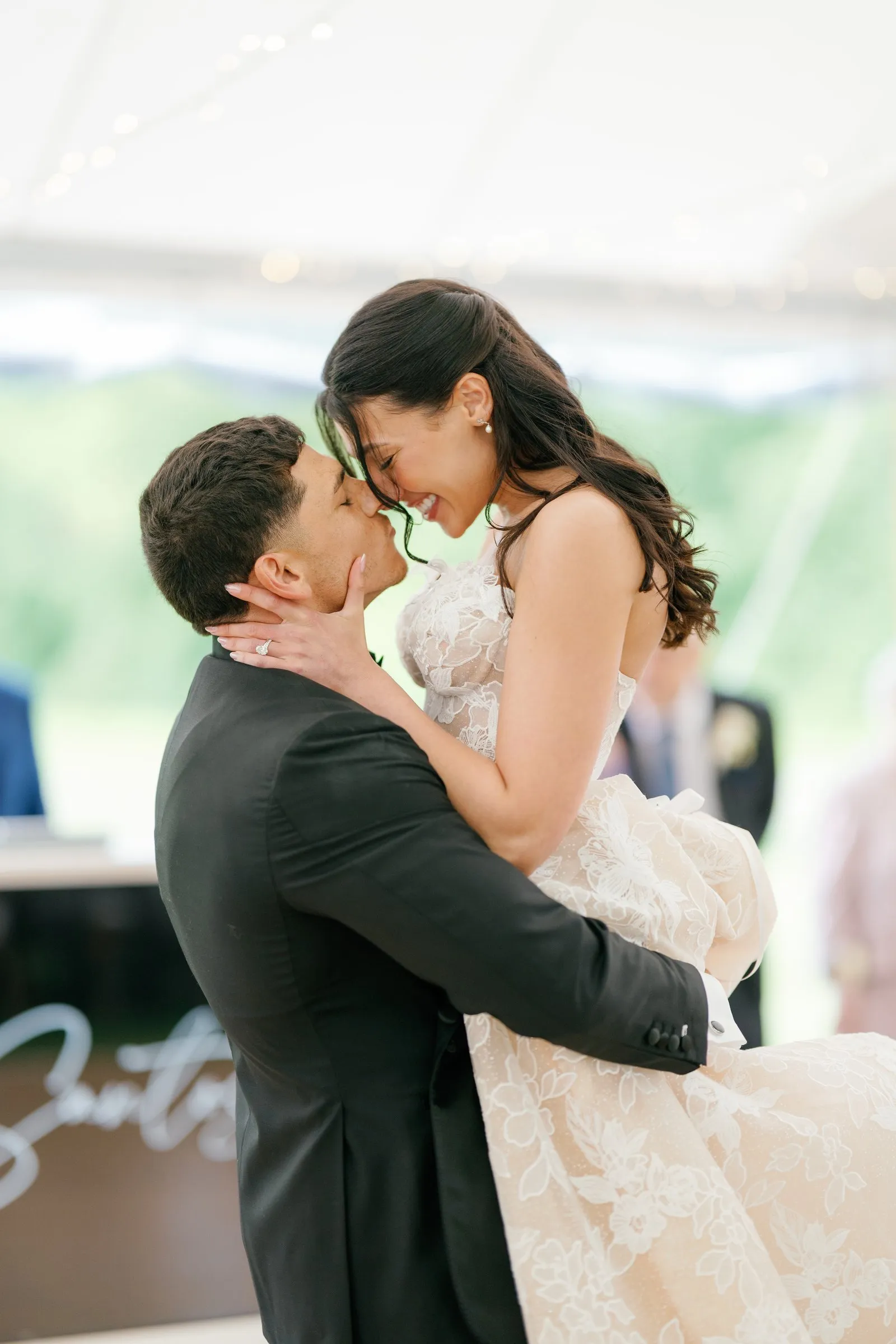 Avery lifting Kayla during their first dance