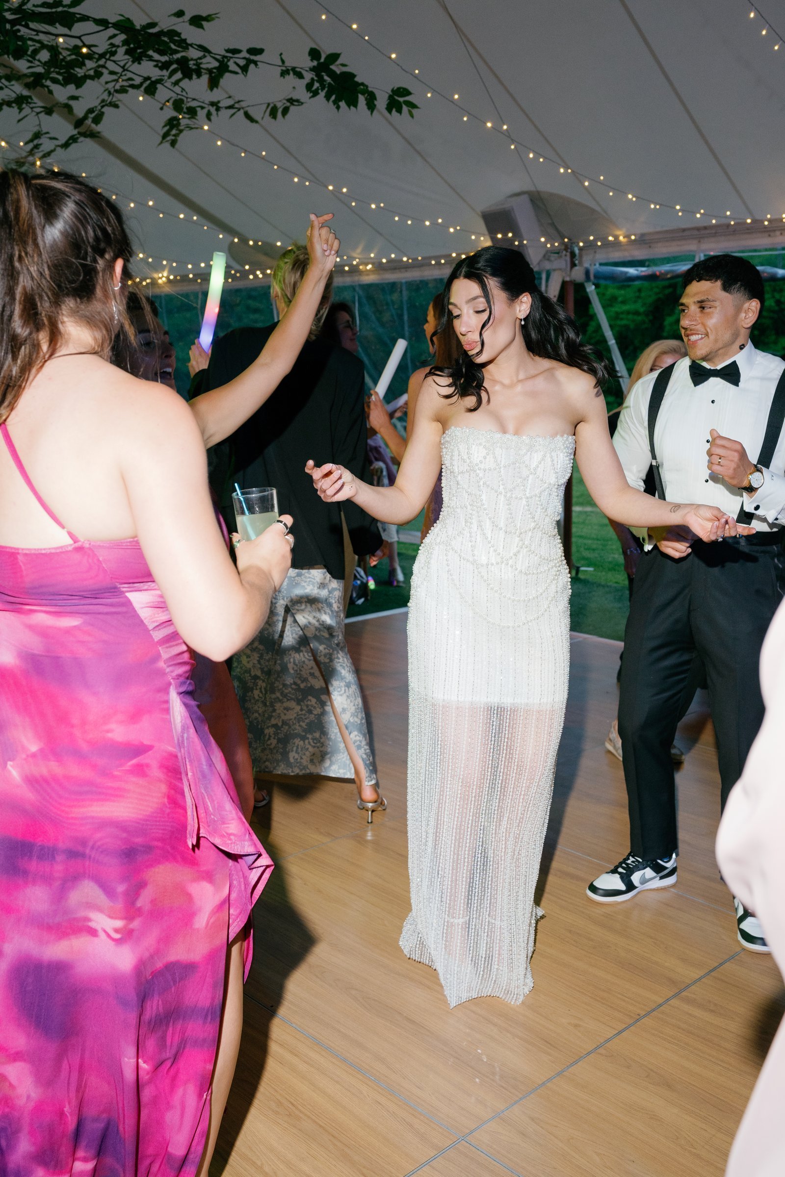 Kayla dancing with guests on the dance floor