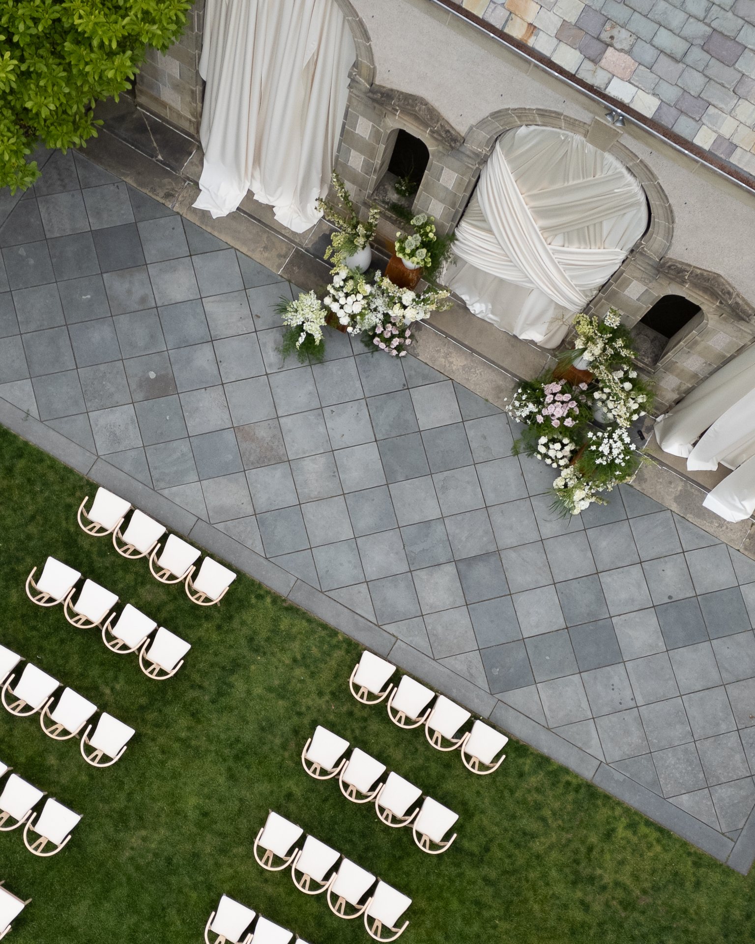 Ceremony at the draped arches seen from above, Glen Manor House. Photographed by Shukhrat Kamalov.
