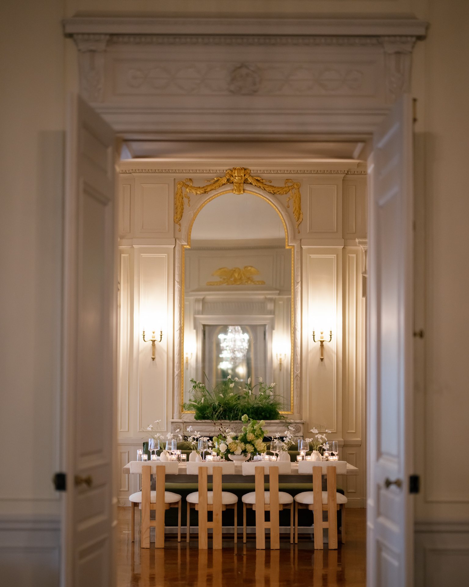 The manor dining room seen through open double doors. Photographed by Shukhrat Kamalov.