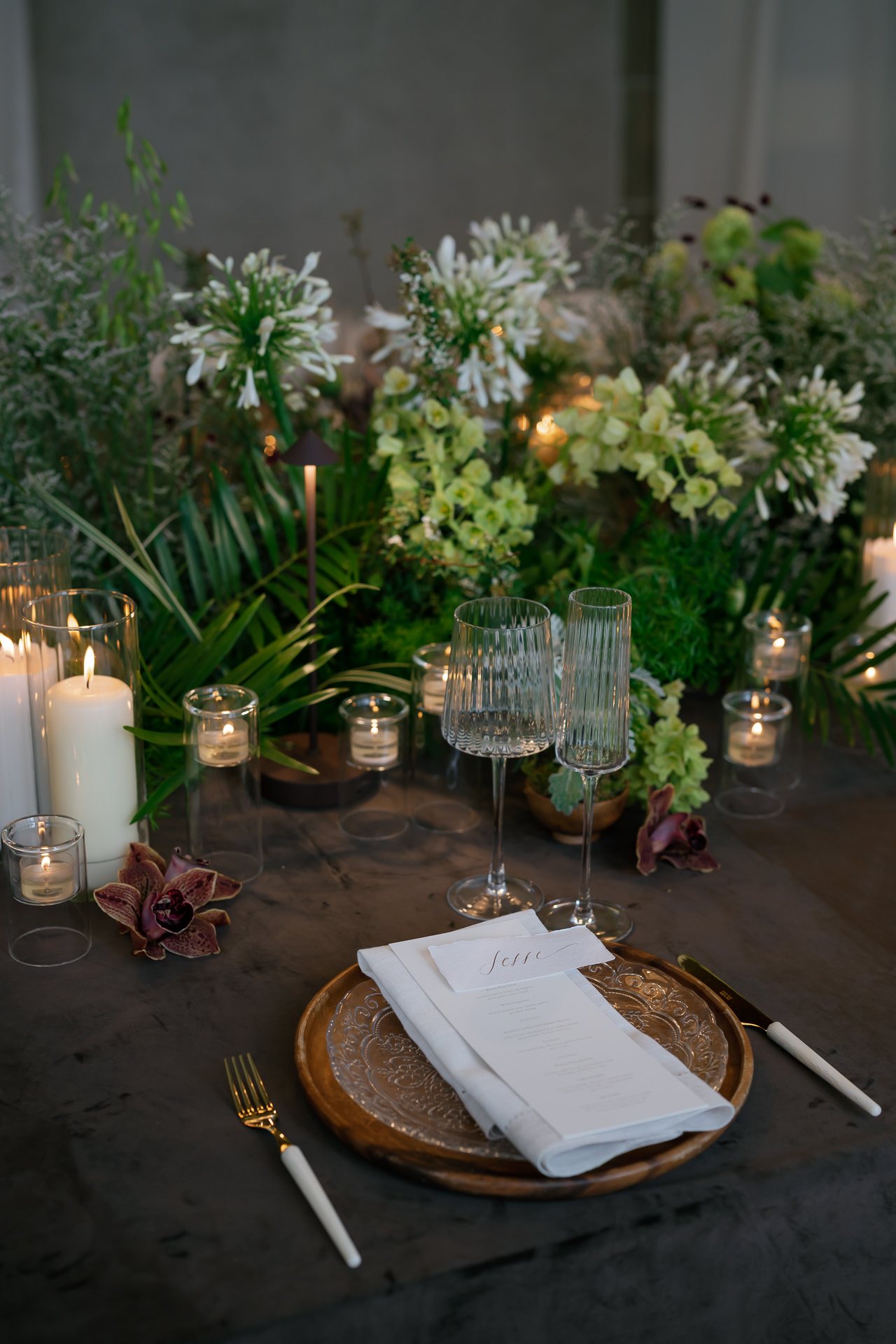 Place setting with a woven charger and white napkin. Photographed by Shukhrat Kamalov.