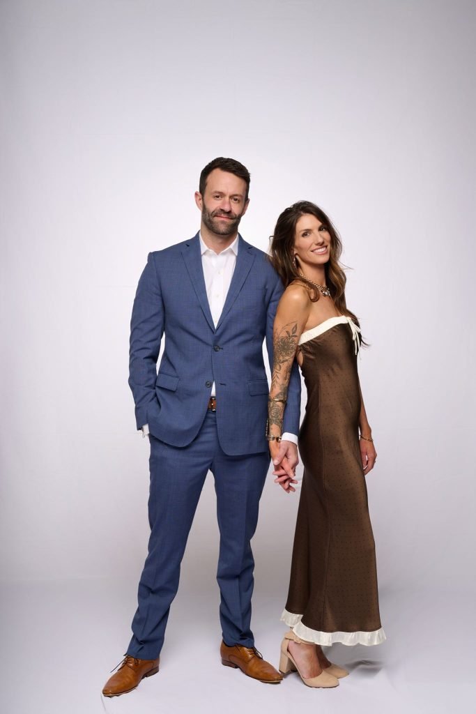 Wedding guest portrait on a white seamless backdrop