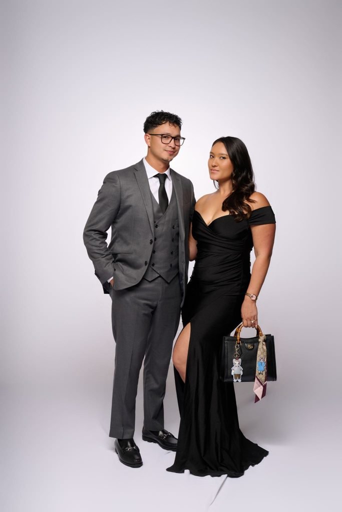 Wedding guest portrait on a white seamless backdrop