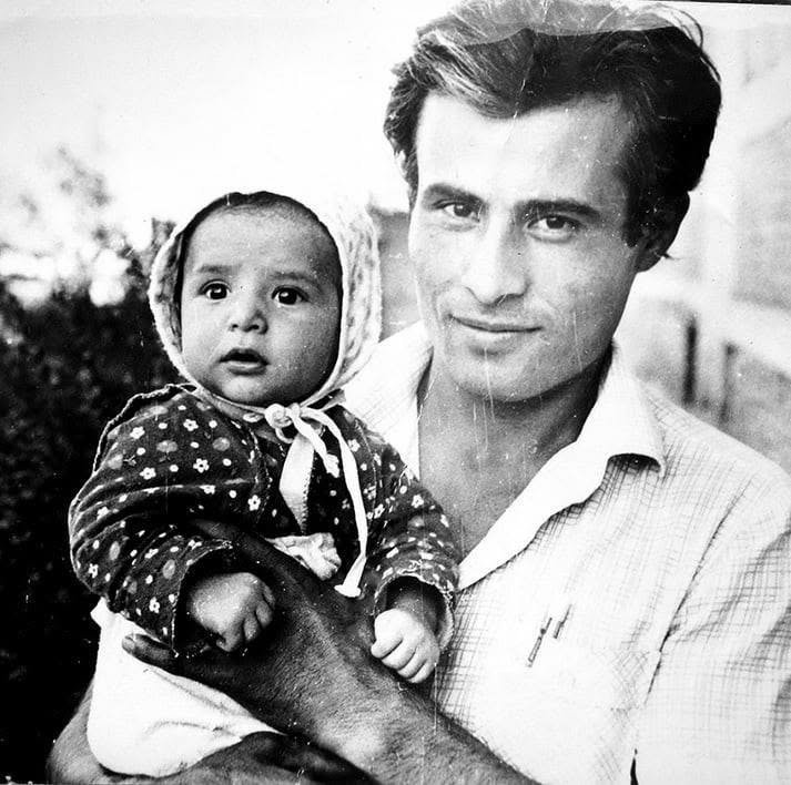 Shukhrat as a baby, held by his father, Bukhara, 1984